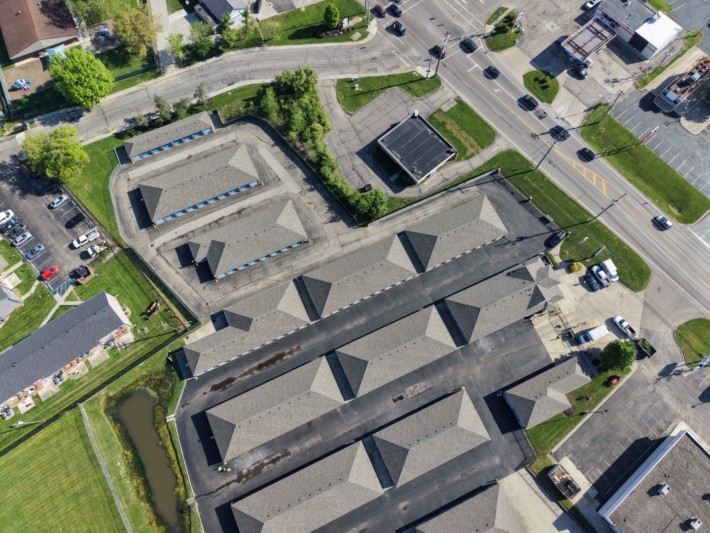 Aerial wide view of commercial roofing project